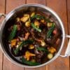 Red wine braised beef cheeks with glazed onions, smoked bacon and wild mushroom