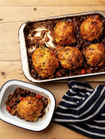 Beef cobbler with cheddar and leek dumplings and Welsh rarebit filling